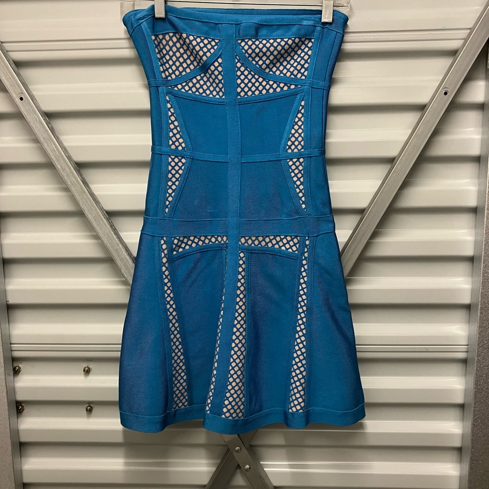 Very pretty part dress, thick, heavy and extremely neat looking